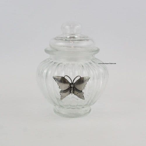 Petit pot décor papillon en étain.