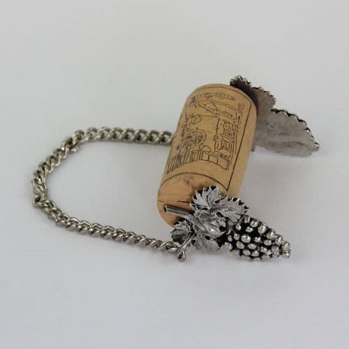 Pique bouchon décor raisin en étain