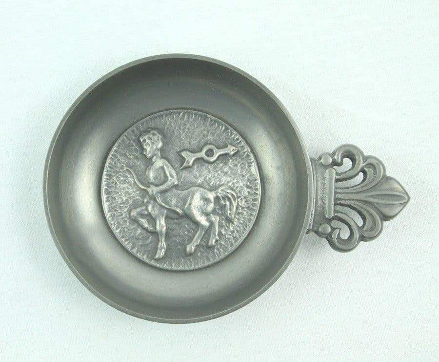 Tastevin ou teste-vin Sagittaire en étain, coupelle