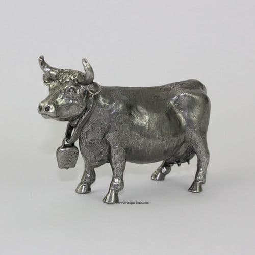 Vache en étain avec cloche au cou