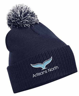ARTISANS NORTH POM-POM BEANIE HAT WITH EMBROIDERED LOGO