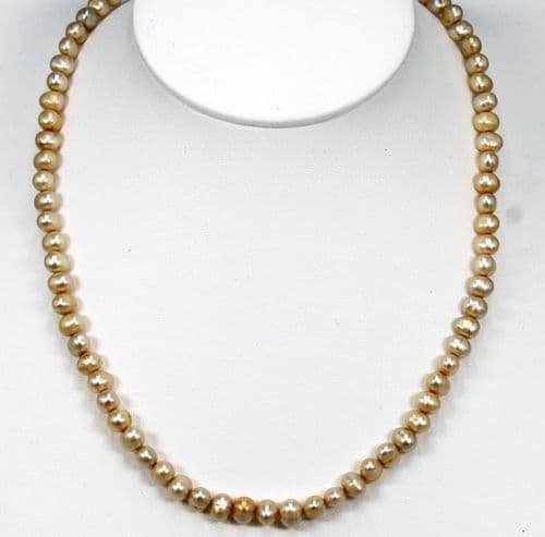 6mm Single Strand of Cultured Freshwater Cream Oval Pearls – 18