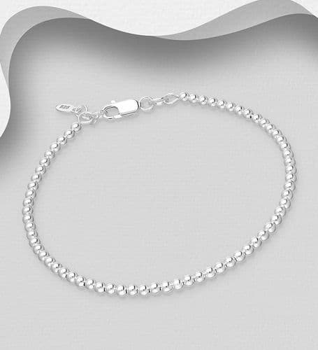 925 Sterling Silver Balls Threaded Onto Wire to Form a Rigid Bangle Type Bracelet