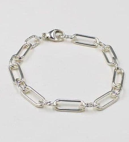 925 Sterling Silver Solid Oblong Linked Bracelet: One Longer Link With a Diamond Cut smaller Link