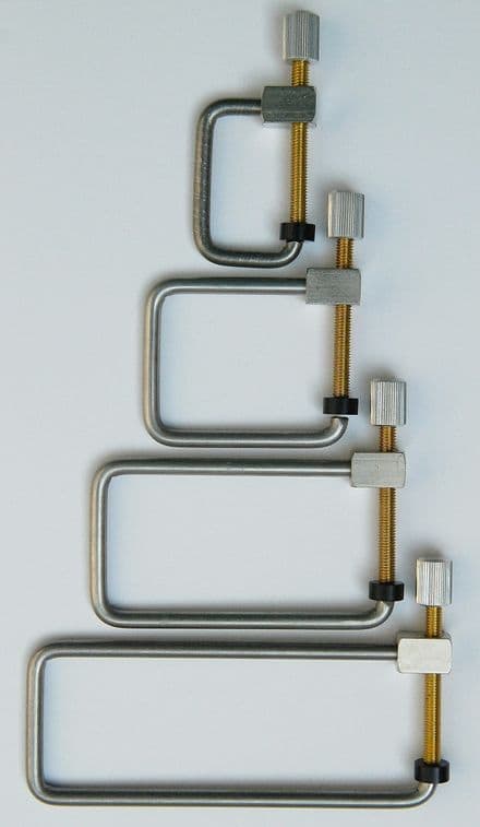 F-hole clamps