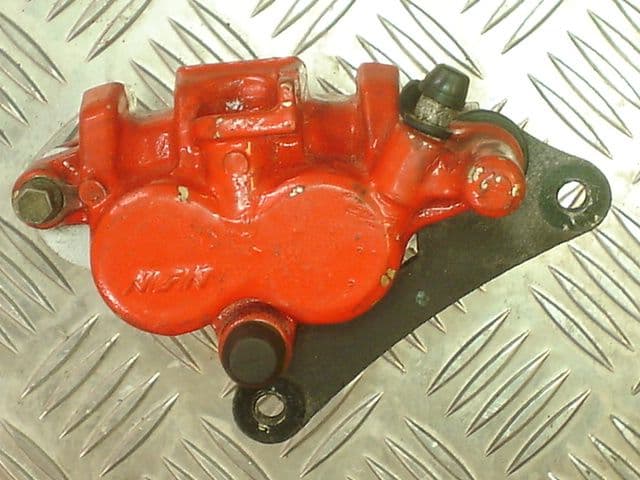 CALIPER, FRONT BRAKE