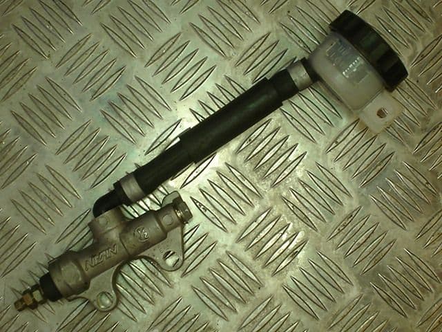 MASTER CYLINDER, REAR BRAKE.