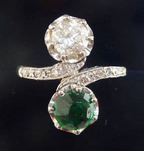 Stunning art deco platinum 1.11ct diamond and emerald crossover vintage antique ring