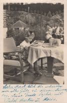 1949 German Child & Toy Pet Dog Poodle On Dinner Table Postcard