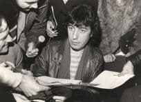 Bill Wyman Rolling Stones Signing Autographs at 1982 Auction Press Photo