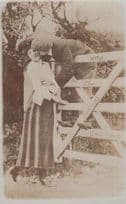 Climbing Over Garden Gate For Kiss Harrassing Lady Antique Real Photo Postcard