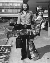 Lulu Maurice Gibb The Bee Gees at Heathrow Airport 9x7 Vintage Press Photo