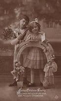 Schoolboy Schoolgirl Uniform + Letter Giant Horseshoe RPC Antique Photo Postcard