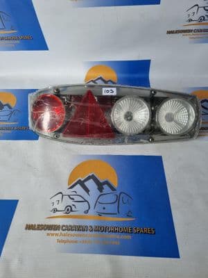 (103) Hella Caravan Silver Near Side Rear Light Cluster - NEW