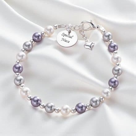 Pearl Bracelet with Engraved Disc Charm.