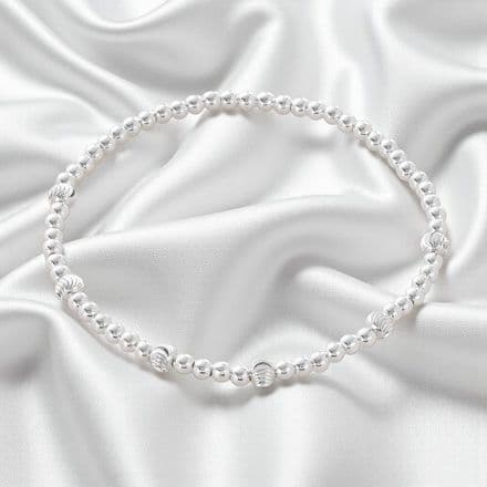 Silver Stacking Bracelet, Moon Cut Beads