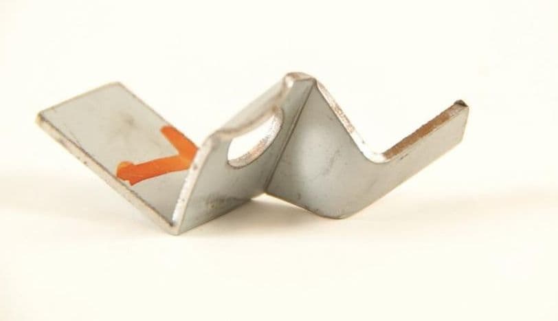 Bracket to locate lower end of left boot strut saloon