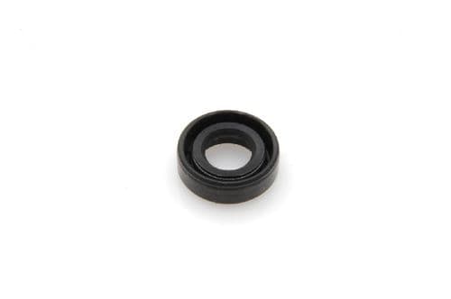 Oil seal for shaft inside distributor drive housing at front of engine