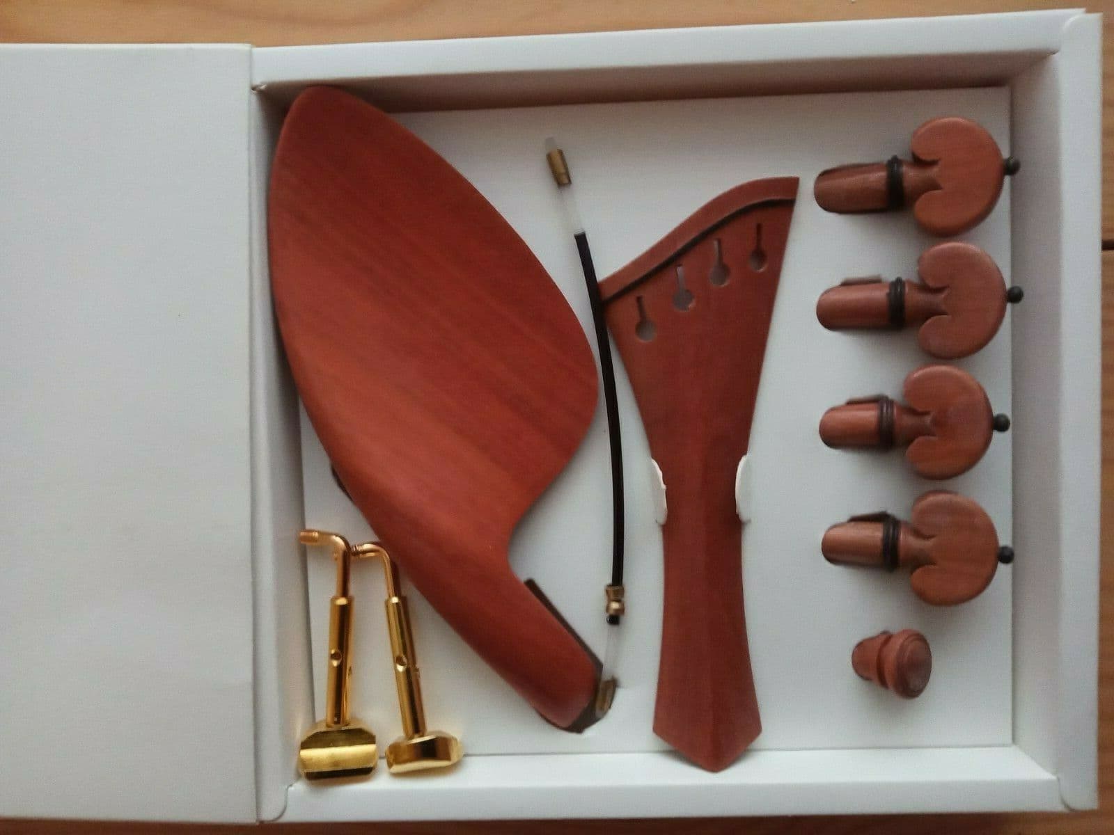 thumbnail image 2 of Violin Strings 4/4 Violin Fittings Parts Set - Wood Chin Rest, Tailpiece, Tuning Pegs & Endpin Violin Tuning Pegs And Endpin Set 2 of 13