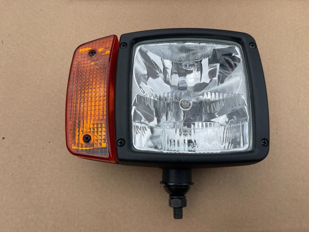 GENUINE HELLA RH HEADLIGHT 1LA 993 975 047 AEBI CATERPILLAR CLAAS JCB JOHN DEER