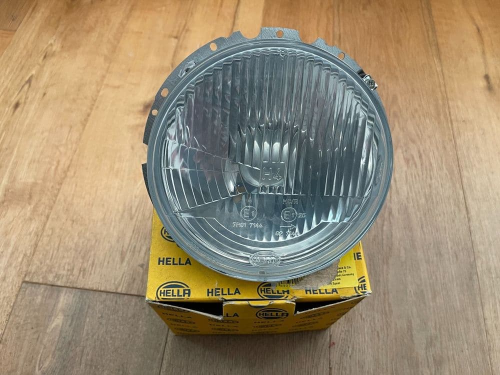 MERCEDES G-CLASS, PUCH, BRAND NEW HEADLIGHT ASSEMBLY GENUINE HELLA 1L8003060691