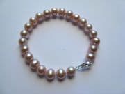Ladies 7.5" 7.5mm pink Freshwater pearl Bracelet with Sterling silver findings