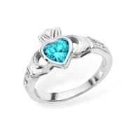 Sterling silver rubover set blue topaz cubic zirconia claddagh ring