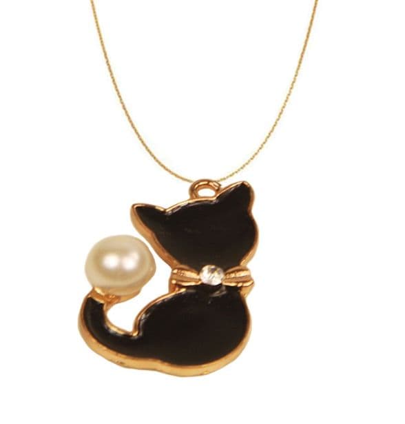 A beautiful butterfly pendant made of mother of pearl and emblazoned with small glittering crystals on a gold metal base. J020010