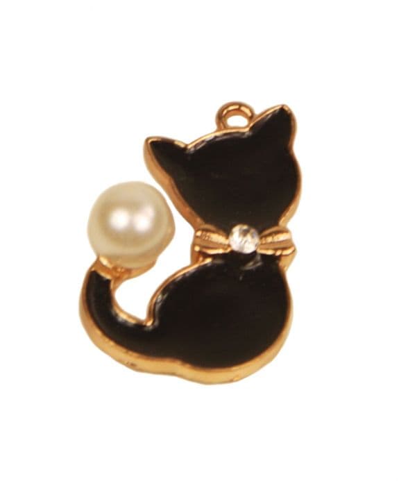 A beautiful butterfly pendant made of mother of pearl and emblazoned with small glittering crystals on a gold metal base. J020010