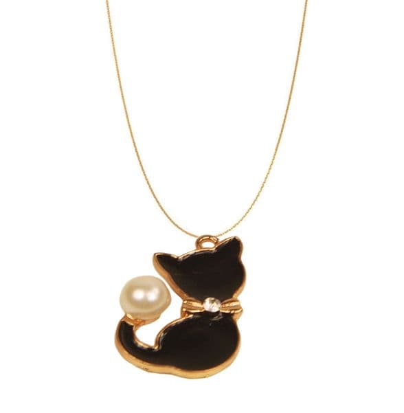 A beautiful butterfly pendant made of mother of pearl and emblazoned with small glittering crystals on a gold metal base. J020010