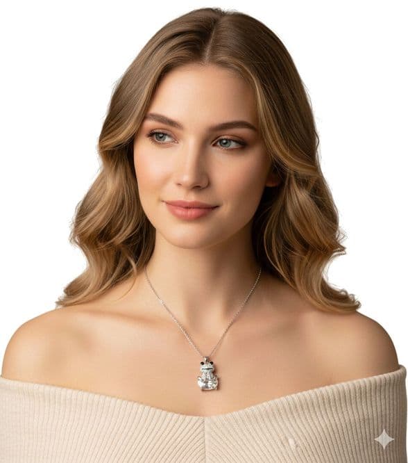 A beautiful butterfly pendant made of mother of pearl and emblazoned with small glittering crystals on a gold metal base. J020010