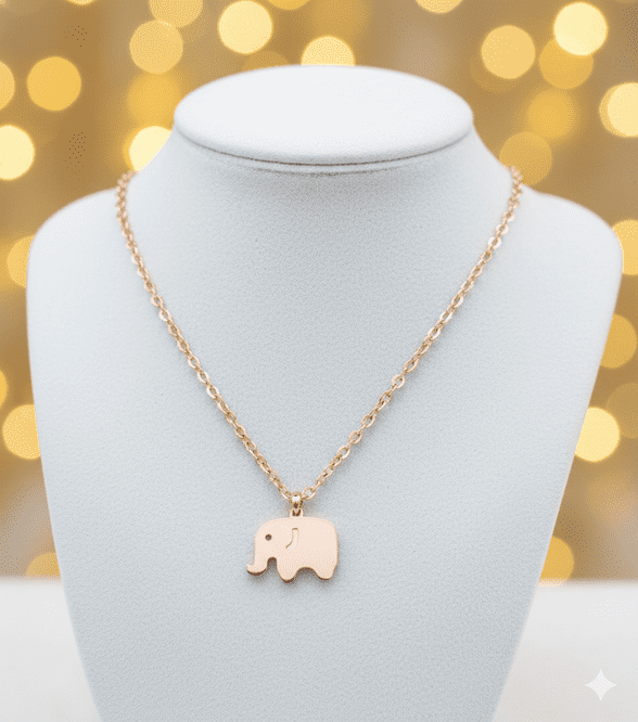 A beautiful butterfly pendant made of mother of pearl and emblazoned with small glittering crystals on a gold metal base. J020010