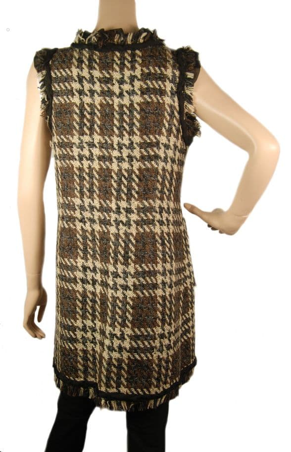 A beautiful butterfly pendant made of mother of pearl and emblazoned with small glittering crystals on a gold metal base. J020010