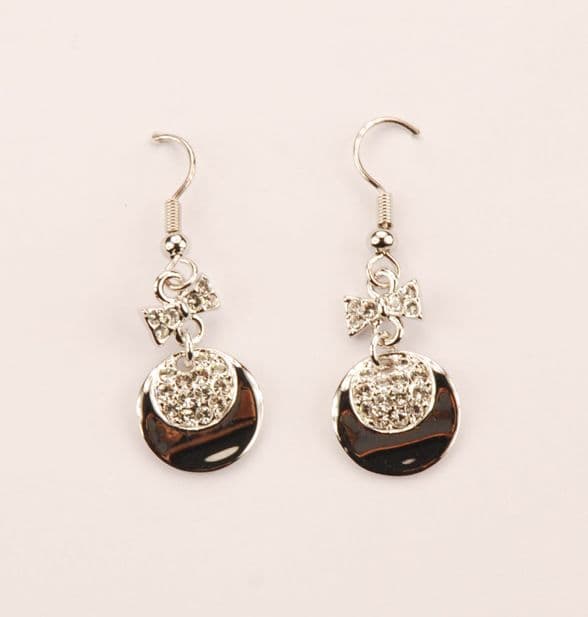 ConMiGo London E110140 Sparkling bow and disc drop earrings contrasted with a mineral effect crescen