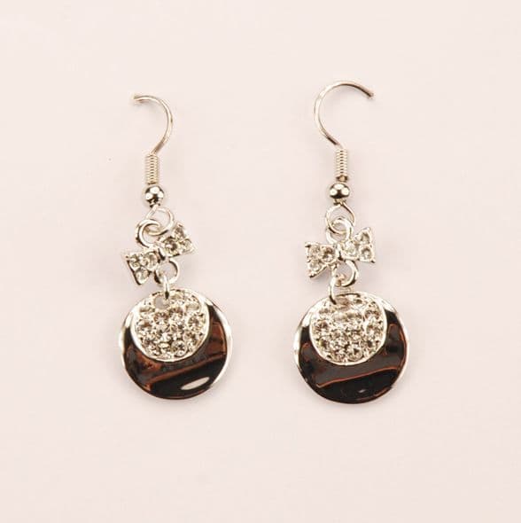ConMiGo London E110140 Sparkling bow and disc drop earrings contrasted with a mineral effect crescen
