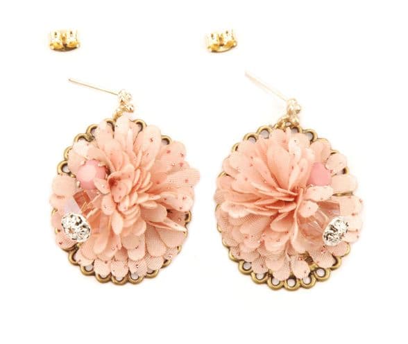 Unique pink and gold drop earrings for that special occasion. This exquisite designer jewellery arrives beautifully packaged in a pretty gift box worth more than £3