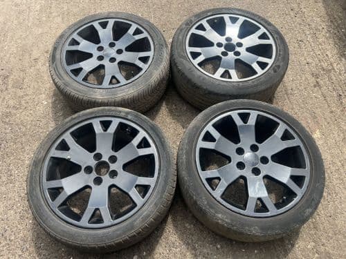 17" GENUINE GM ASTRA GSI SNOWFLAKE ALLOYS. BLACK WITH TYRES