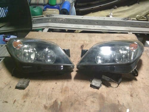 ASTRA MK5 VXR GENUINE GM BLACK INSERT HEADLIGHTS, PAIR WITH HID's