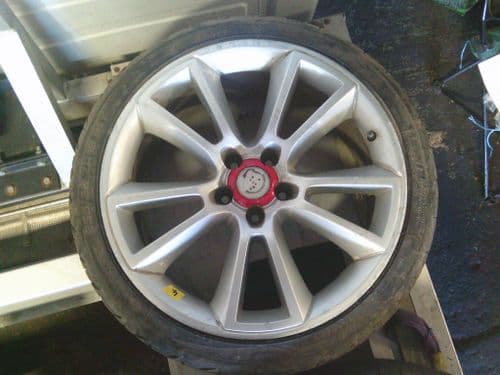 ASTRA VXR 19" GENUINE GM RONAL ALLOY  WHEEL IN SILVER & TYRE. SLIGHT BUCKLE.
