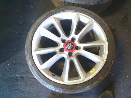 ASTRA VXR 19" GENUINE GM RONAL ALLOY  WHEEL IN SILVER & TYRE. SLIGHT FLAT SPOT.