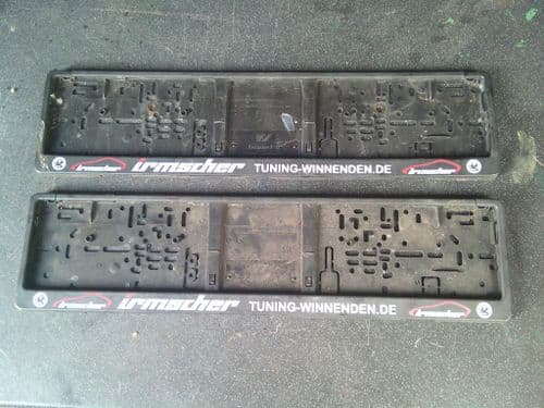 IRMSCHER NUMBER PLATE HOLDERS / SURROUNDS PAIR