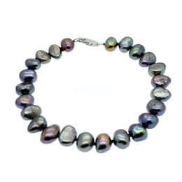 Pearl Bracelet - AA 7mm Baroque Pearls - Sterling Silver Lobster Clasp. Available in White Black.
