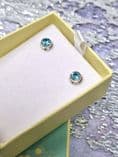 Light Blue Topaz Stud Earrings