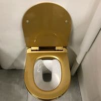 GOLDEN TOILET WALL HUNG COMPACT RIMLESS GOLD WC WITH SLIM SOFT CLOSING SEAT