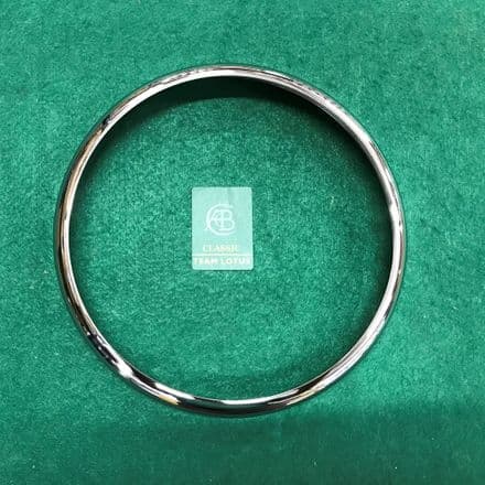 Headlamp Outer Bezel | 697