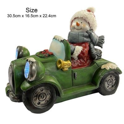 VERY LARGE FESTIVE SNOWMAN RIDING LIGHT UP CAR (NF3600110-2) Christmas