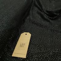 Jersey Polyester Dress Fabric - Black with Gold Spots