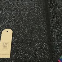 Jersey Polyester Dress Fabric - Black with Gold Spots