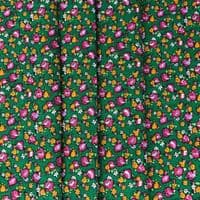 VINTAGE COTTON: Outlined Pink and Orange Ditsy Flowers on Green.