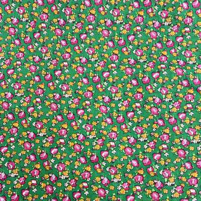 VINTAGE COTTON: Outlined Pink and Orange Ditsy Flowers on Green.